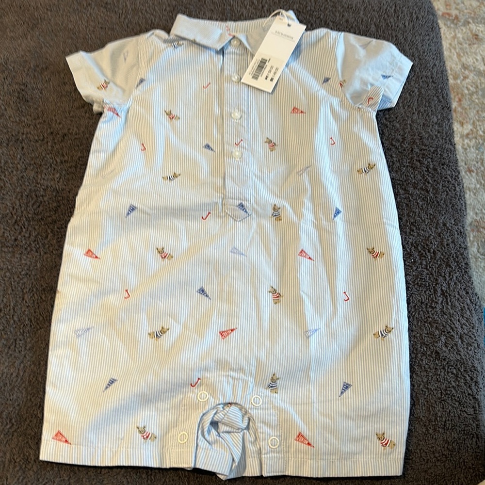 Little boy one puce shorts romper.